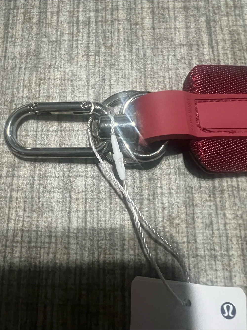 lululemon athletica Never Lost key strap in burgundy with logo